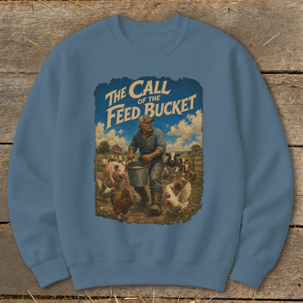 Sweatshirt with graphic of farmer carrying feed bucket surrounded by farm animals and text "The Call of the Feed Bucket".