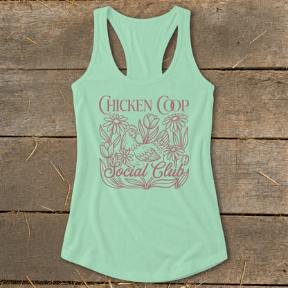 Light green tank top with "Chicken Coop Social Club" text and chicken with flowers graphic.