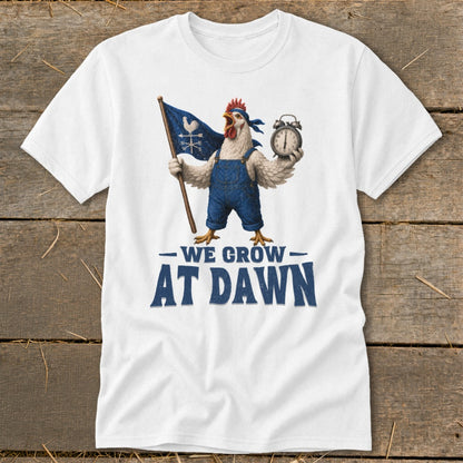 Chicken in overalls holding a flag and alarm clock with text "We Grow At Dawn."