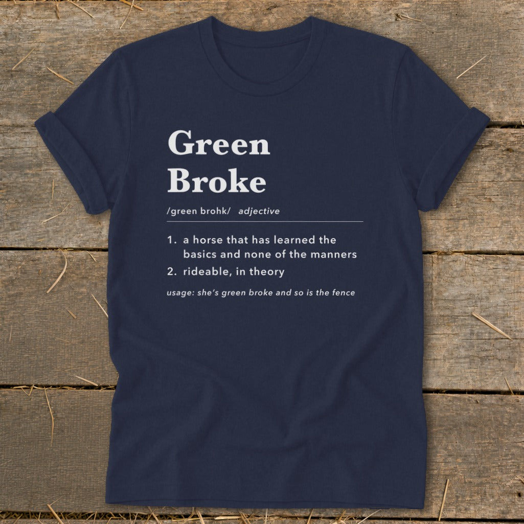 A dark blue t-shirt printed with a satirical dictionary definition for the phrase Green Broke.