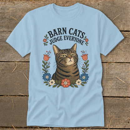 Light blue t-shirt with "Barn Cats Judge Everyone" text and a grumpy cat graphic.