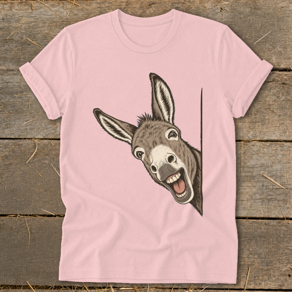 Pink t-shirt with a cartoon donkey peeking from the side.