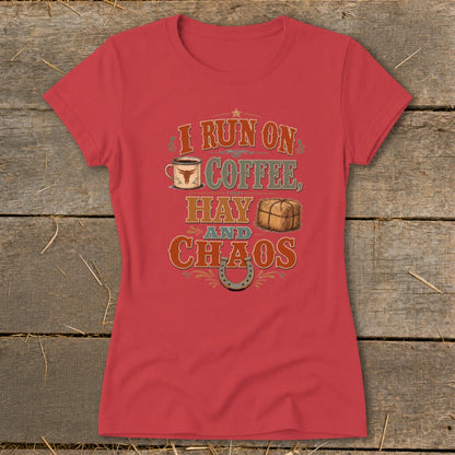 Red t-shirt with text "I Run On Coffee, Hay and Chaos," coffee cup, hay bale, and horseshoe.