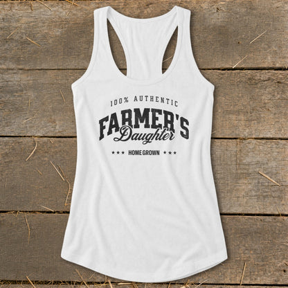 White racerback tank top with "100% Authentic Farmer's Daughter Home Grown" text.