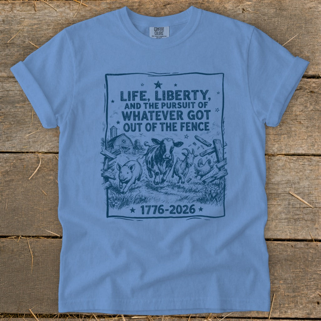 Light blue t-shirt with graphic depicting farm animals breaking out of a fence.