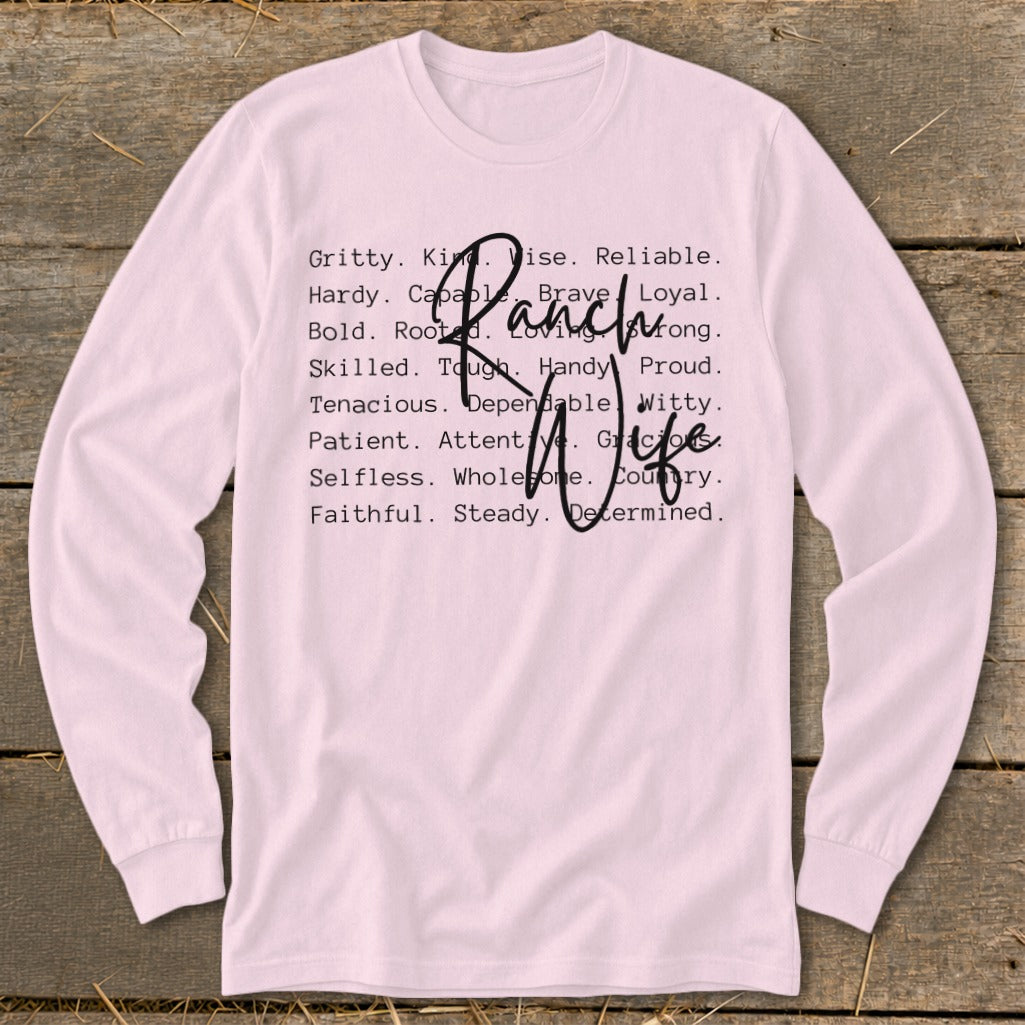 Pink long sleeve shirt with "Ranch Wife" text listing positive attributes.