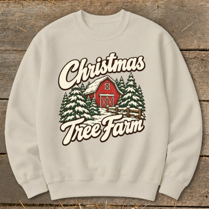 Christmas Tree Farm graphic on a light beige crewneck sweatshirt.