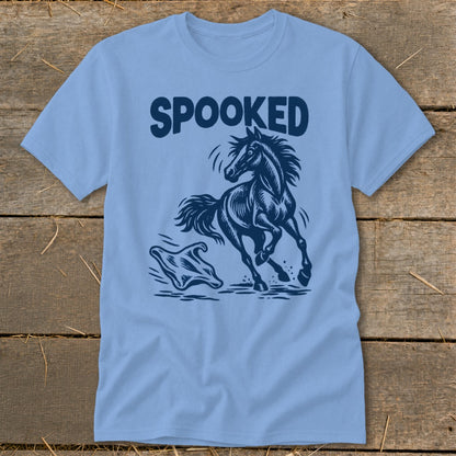 Light blue t-shirt with "SPOOKED" text above a startled horse and a ghost.