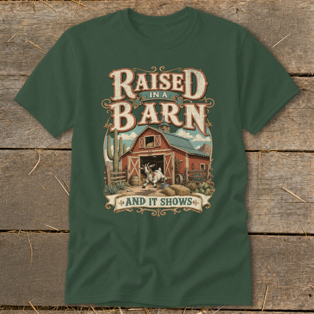 Green t-shirt with "Raised in a Barn And It Shows" graphic featuring a goat and red barn.