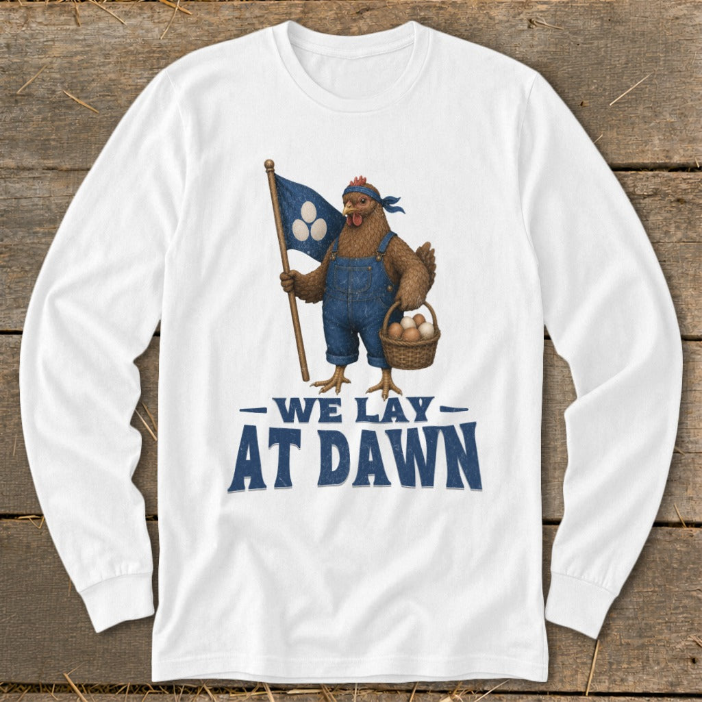 Chicken wearing overalls, holding flag and basket of eggs, text "We Lay At Dawn".
