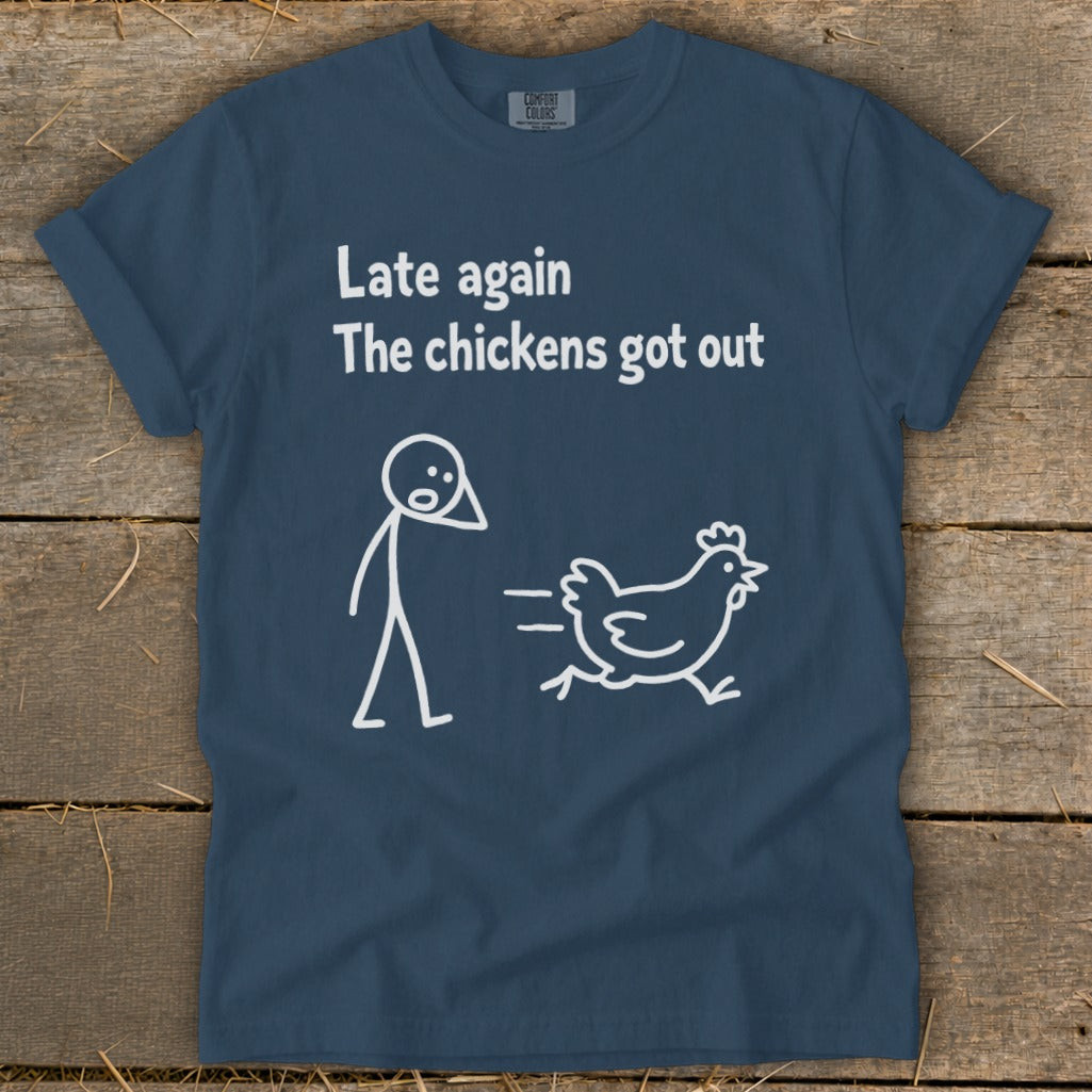 Navy t-shirt with "Late again the chickens got out" text and a stick figure chasing a chicken.