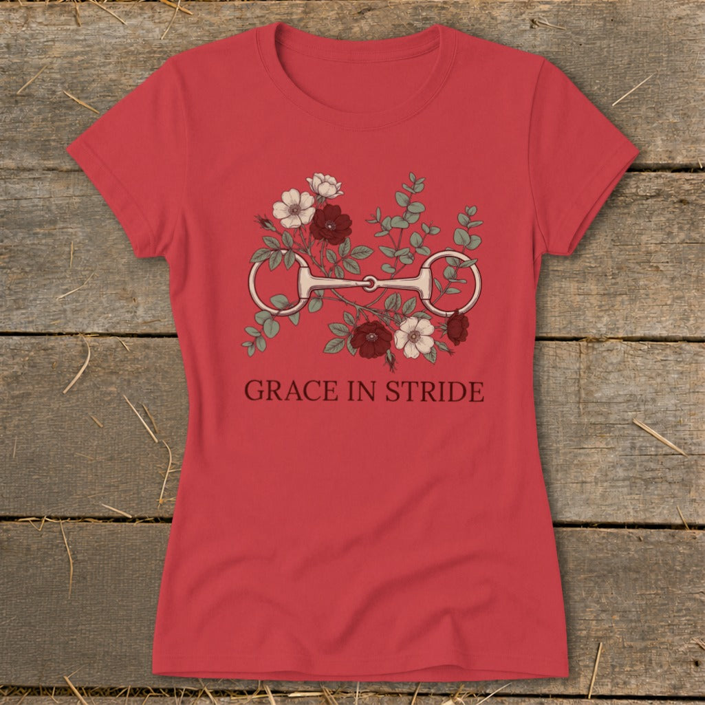 Red t-shirt with floral horse bit graphic and text "GRACE IN STRIDE".