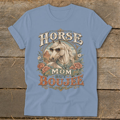 Distressed graphic on light blue t-shirt with white horse, sunglasses, roses, and text "Horse Mom But Boujee".