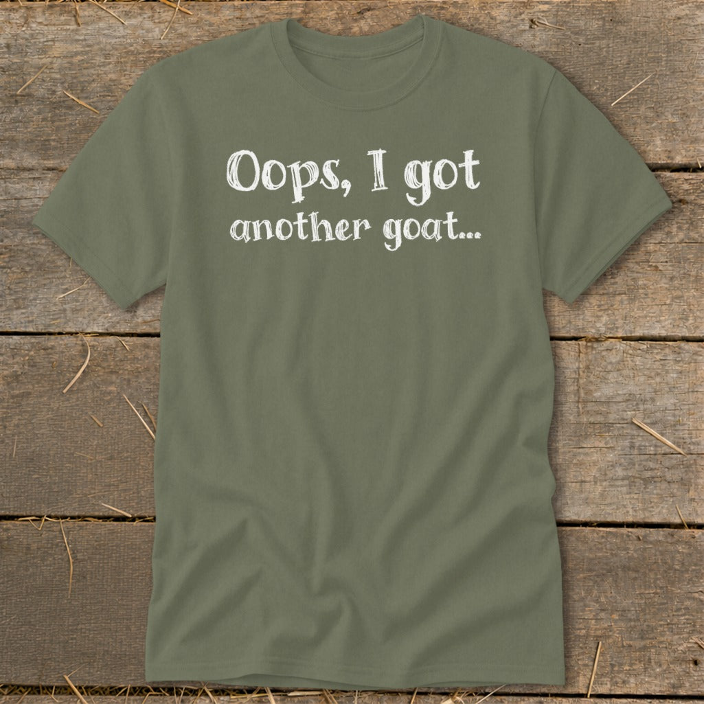 Olive green t-shirt with white text "Oops, I got another goat..."