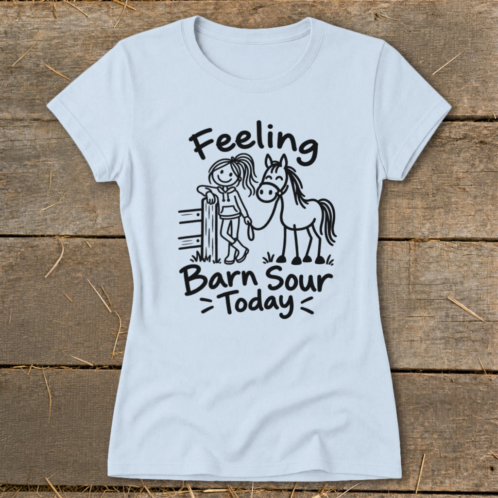 Light blue t-shirt with line drawing of girl and horse, text reads "Feeling Barn Sour Today".
