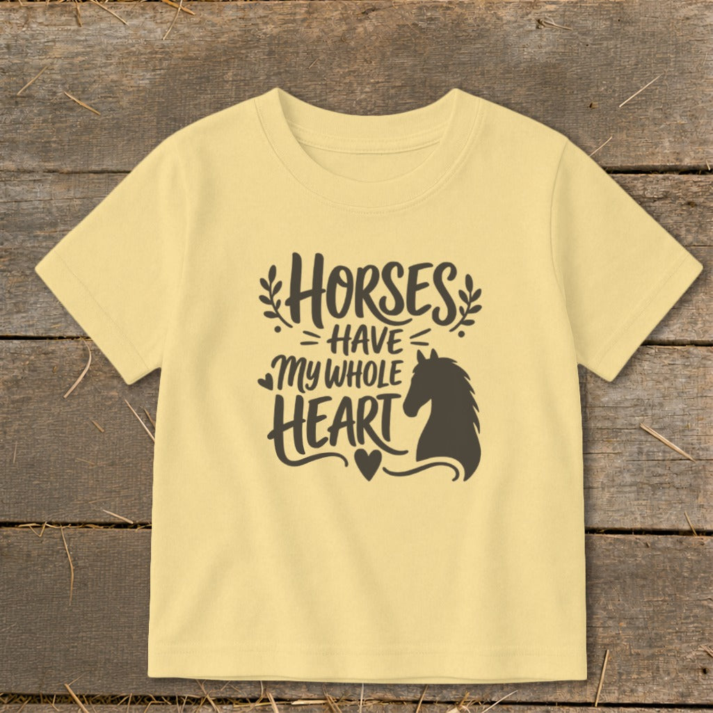 Light yellow t-shirt with "Horses Have My Whole Heart" text and horse silhouette.