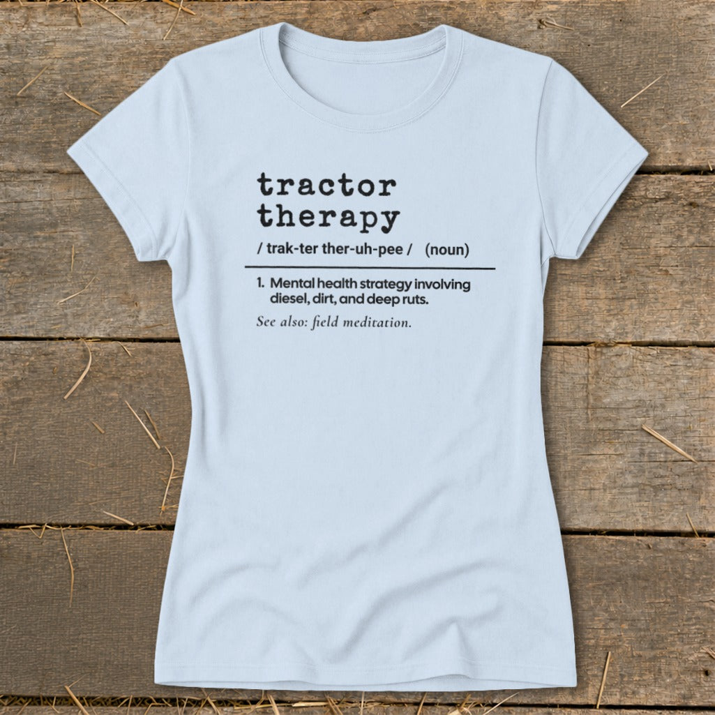 Light blue t-shirt with "Tractor Therapy" definition text printed in black.