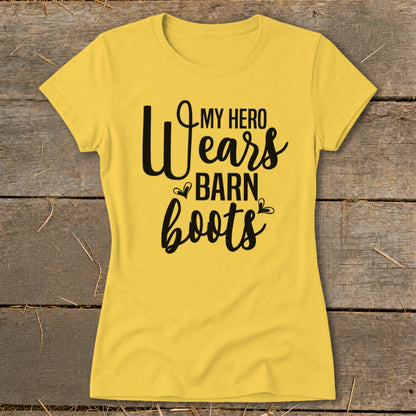 Yellow t-shirt with black text reading "MY HERO Wears BARN boots".
