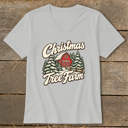 Christmas Tree Farm graphic with red barn and snowy pine trees.