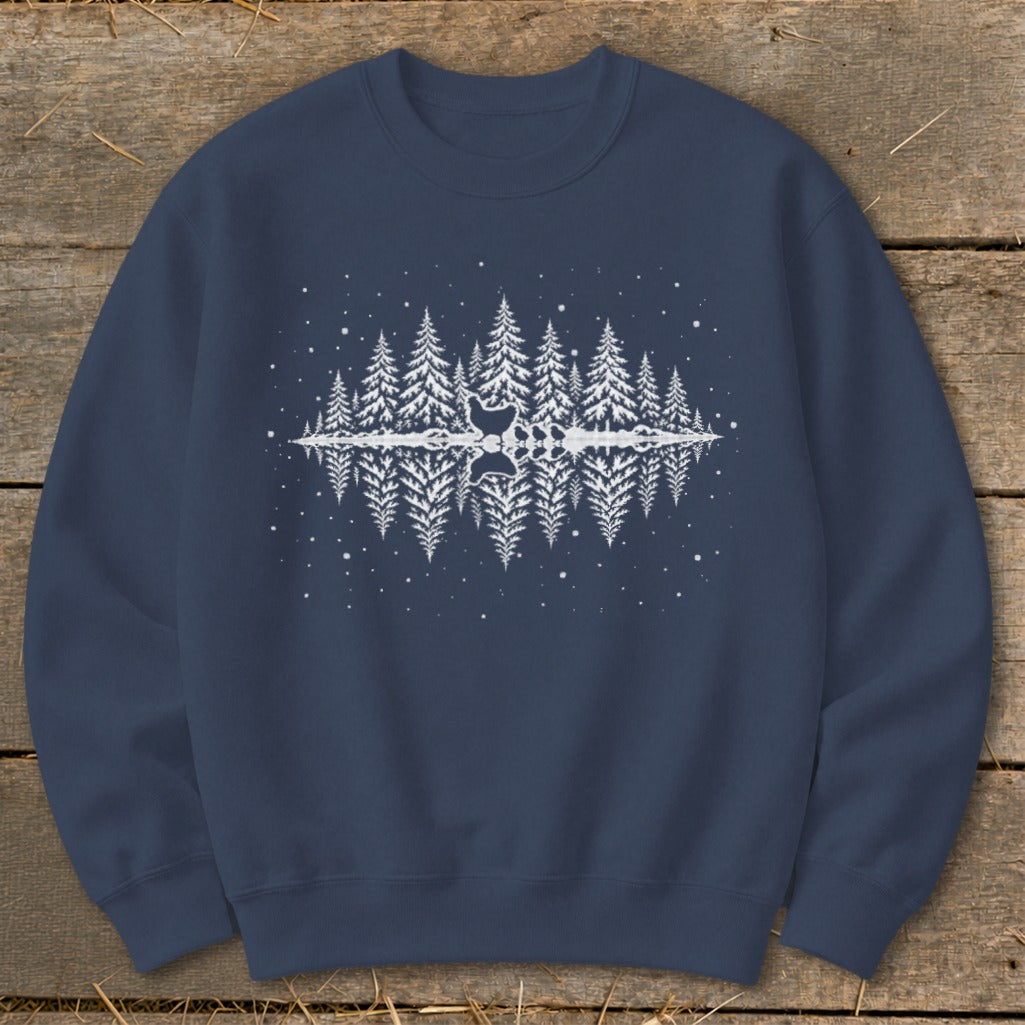 Dark blue sweatshirt with white reflection of trees and antlers graphic.