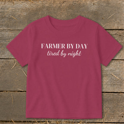 Maroon t-shirt with white text "FARMER BY DAY tired by night."