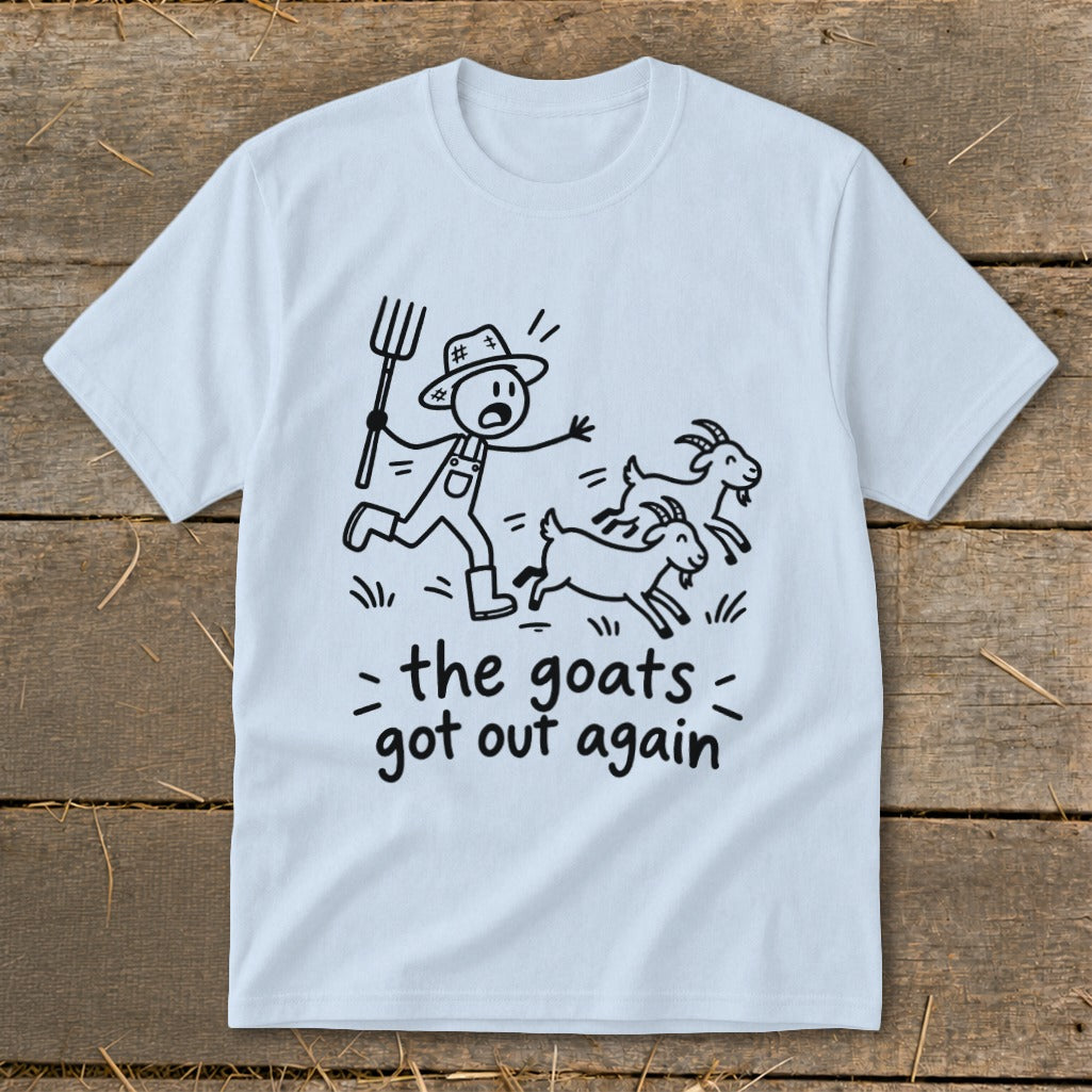 Light blue t-shirt with a cartoon farmer chasing goats, text "the goats got out again".