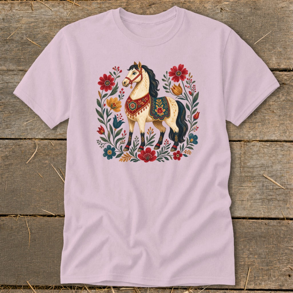 Light pink t-shirt with a decorative horse and floral folk art design.