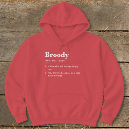 Red hoodie with "Broody" definition: a hen who won't leave the nest, or being under a blanket.