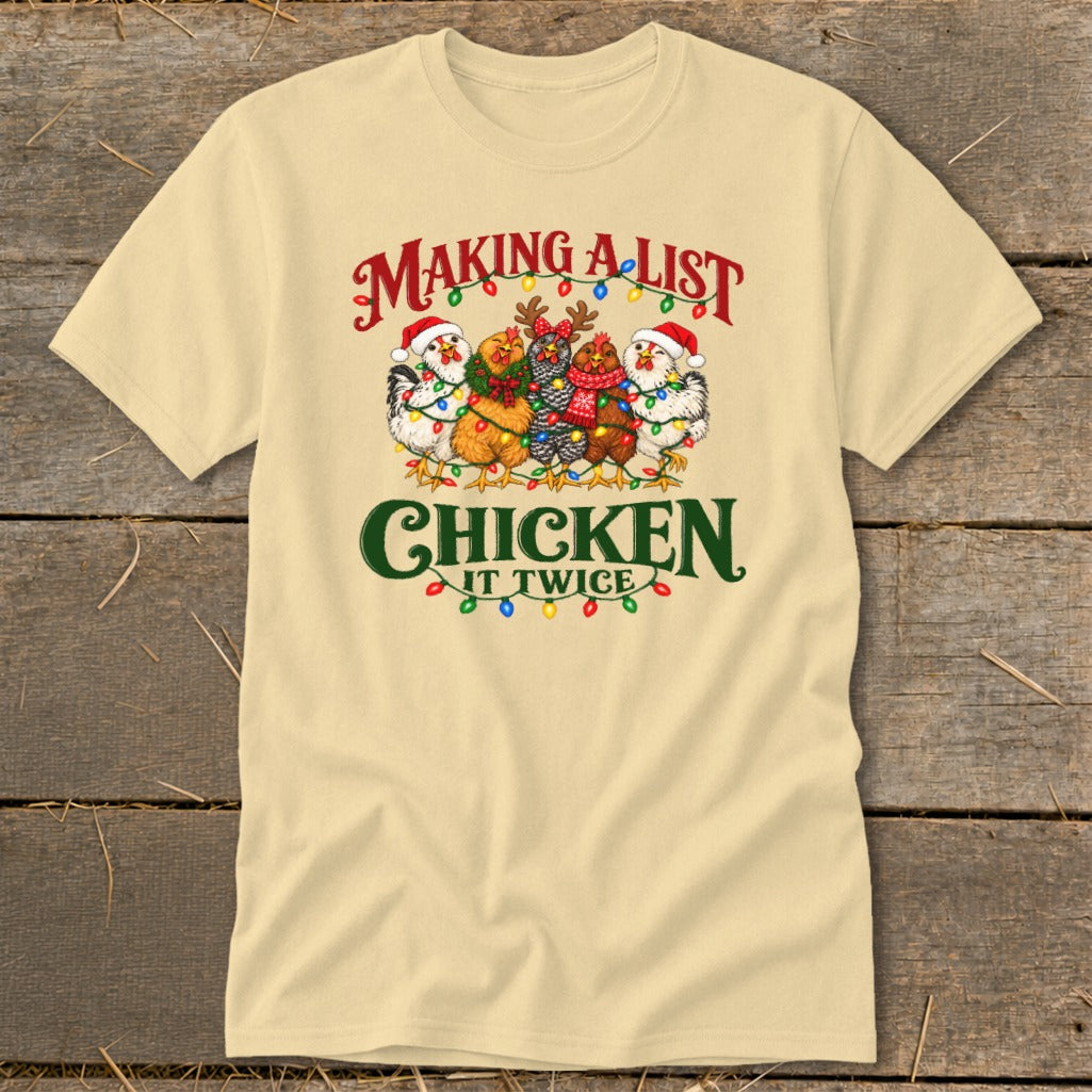 T-shirt with chickens wearing Santa hats and scarves, with Christmas lights.
