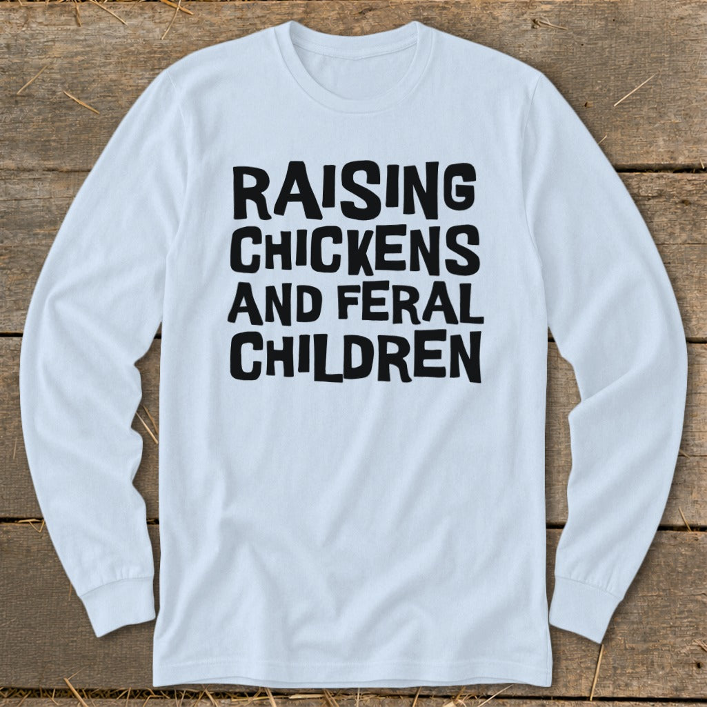 Light blue long sleeve shirt with "RAISING CHICKENS AND FERAL CHILDREN" in black text.