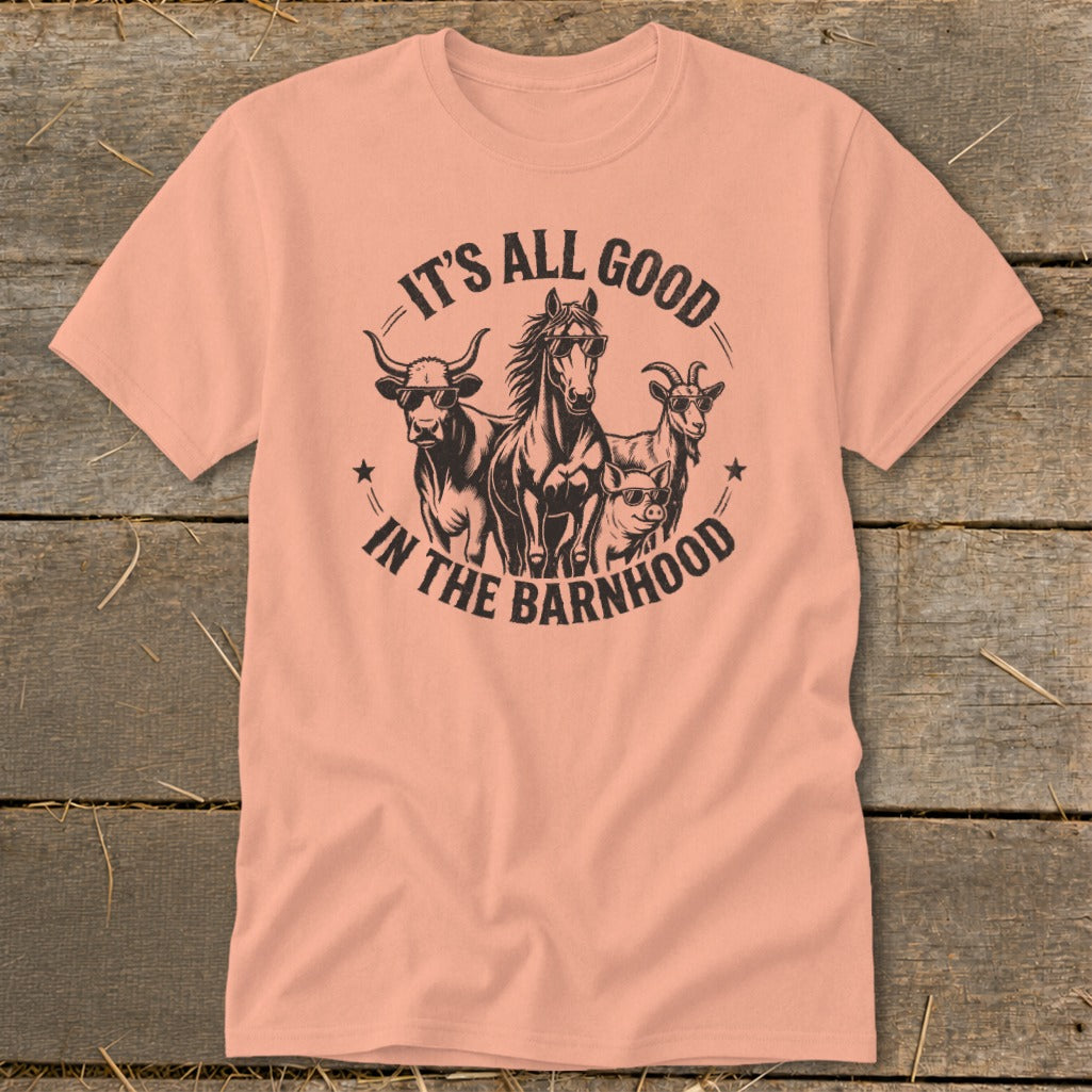 Peach t-shirt with a graphic of farm animals wearing sunglasses and text.