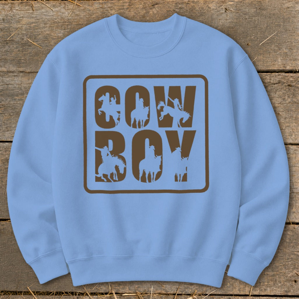 Light blue sweatshirt with brown "COWBOY" text and horse silhouettes.