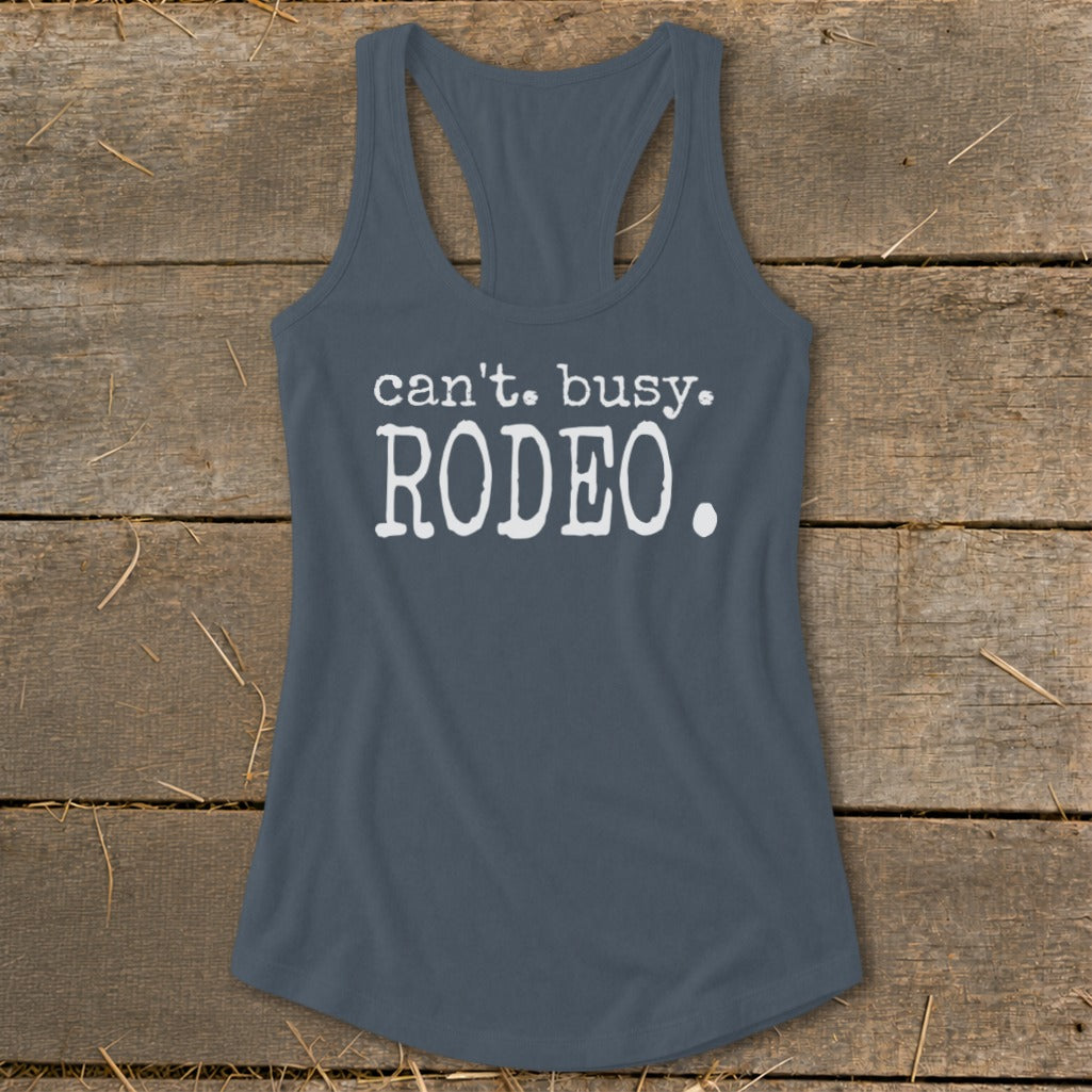 Tank top with white text reading "can't. busy. RODEO." on a gray background.