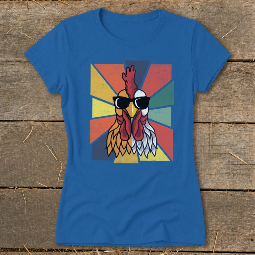 Blue t-shirt with a colorful graphic of a rooster wearing sunglasses.