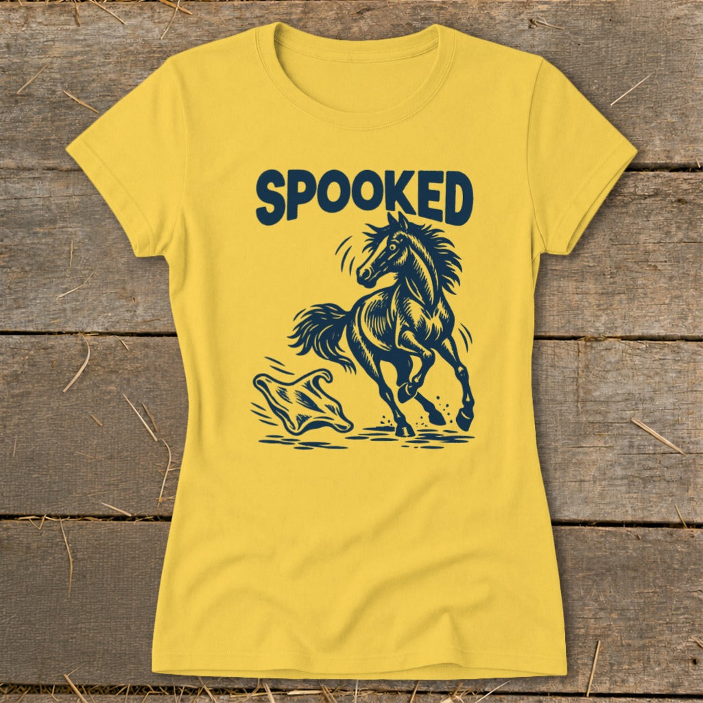 Yellow t-shirt with "SPOOKED" text and a startled horse next to a ghost.