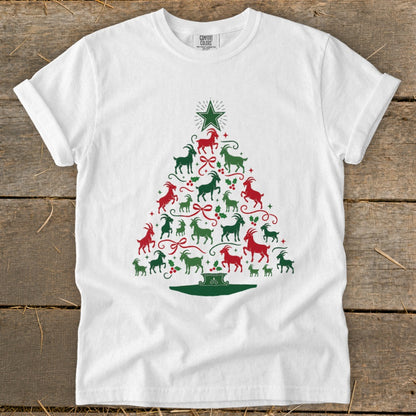 White t-shirt with red and green goat Christmas tree graphic and star.