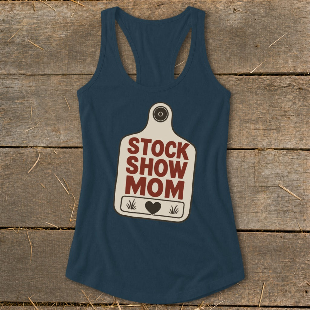 Navy tank top with "Stock Show Mom" text and heart on a tag graphic.