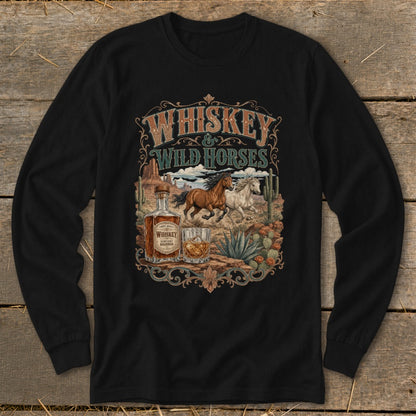 Long sleeve black t-shirt with "Whiskey & Wild Horses" text, horses, whiskey bottle, and desert scene.