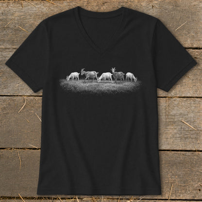 Black v-neck t-shirt with a graphic of five goats grazing in a field.