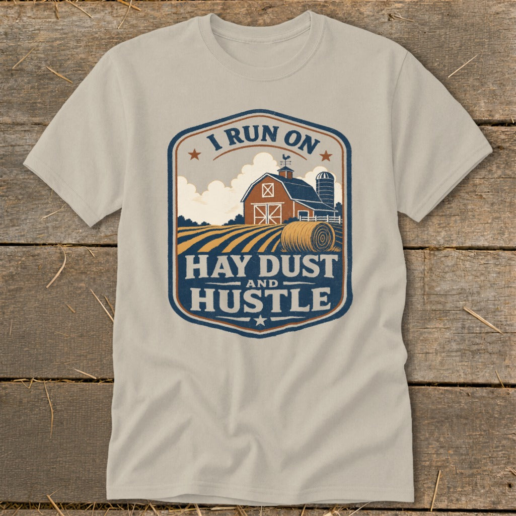 T-shirt with farm graphic and text "I Run On Hay Dust And Hustle".