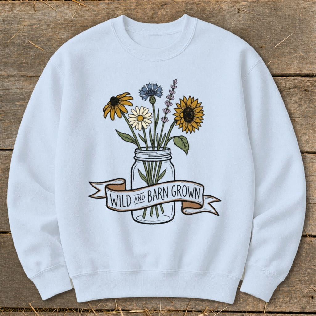 Light blue sweatshirt with mason jar bouquet and "WILD AND BARN GROWN" banner.