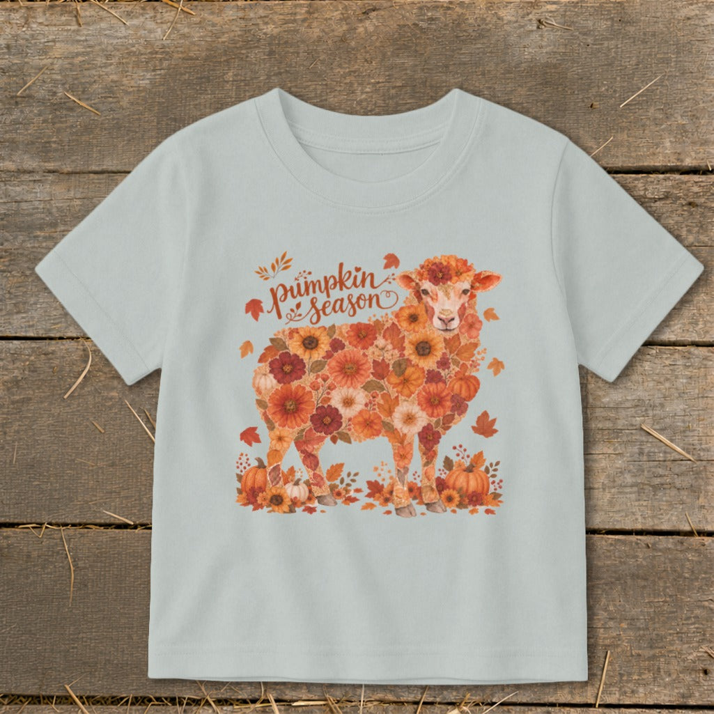 Light blue t-shirt with a sheep illustration made of autumn flowers and the text "pumpkin season".