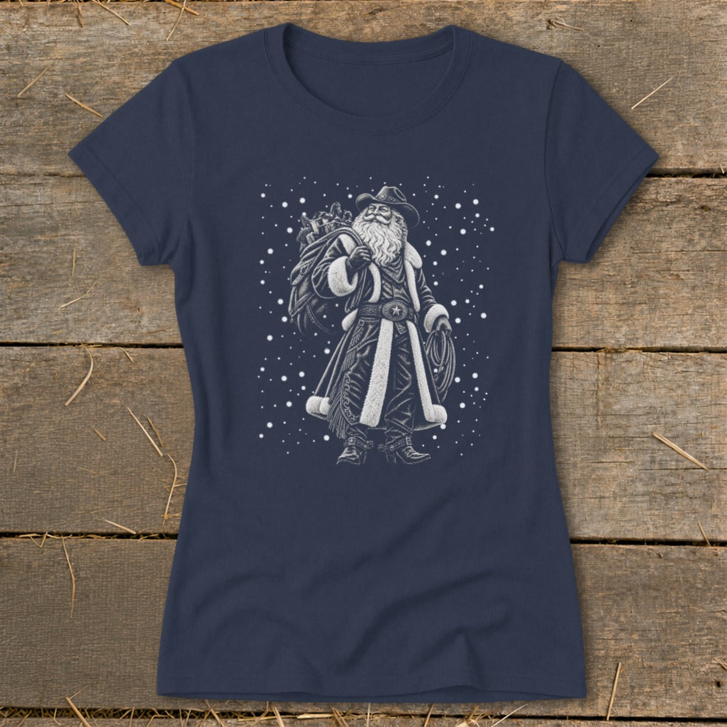 Santa Claus wearing a cowboy hat and Western attire, carrying a sack of gifts.