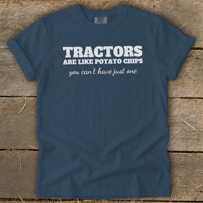 Navy t-shirt with white text "Tractors are like potato chips you can't have just one".