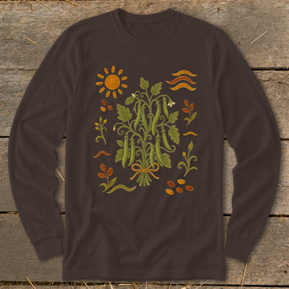 Brown long-sleeve shirt with a vintage botanical illustration of pea pods, sun, and wavy lines.