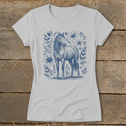 Light grey t-shirt with a blue sketch of a horse surrounded by flowers and foliage.
