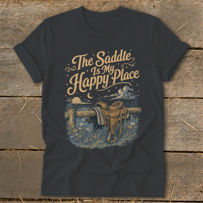 T-shirt with graphic of a saddle on a fence, text "The Saddle Is My Happy Place".