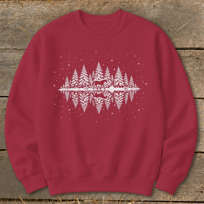 Red sweatshirt with white graphic of horse in pine forest with reflection.