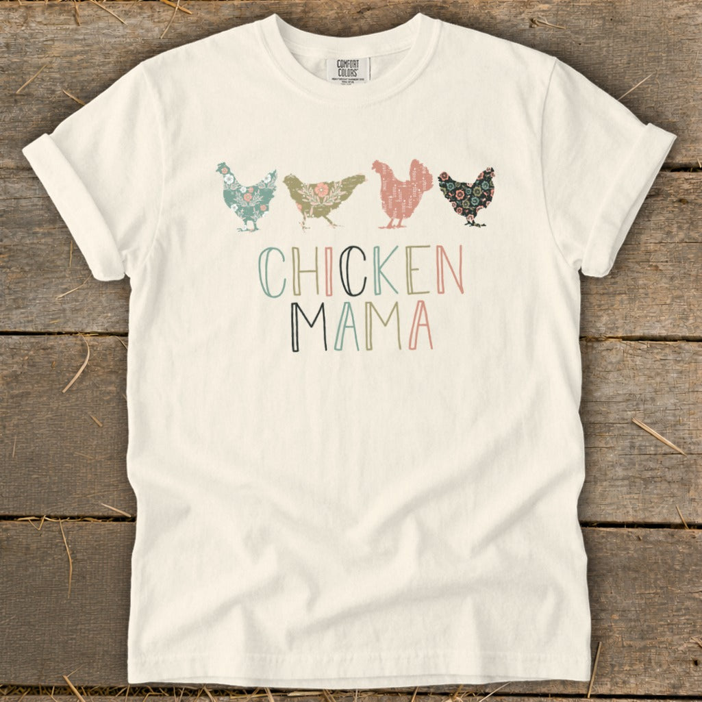 Cream t-shirt with floral chickens and "CHICKEN MAMA" text in pastel colors.