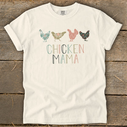 Cream t-shirt with floral chickens and "CHICKEN MAMA" text in pastel colors.
